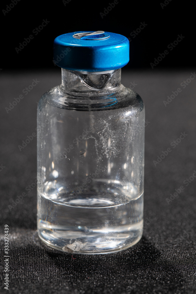 The vial from which the medicine is taken with a syringe and needle. The vial from which the medicine is taken with a syringe and needle.