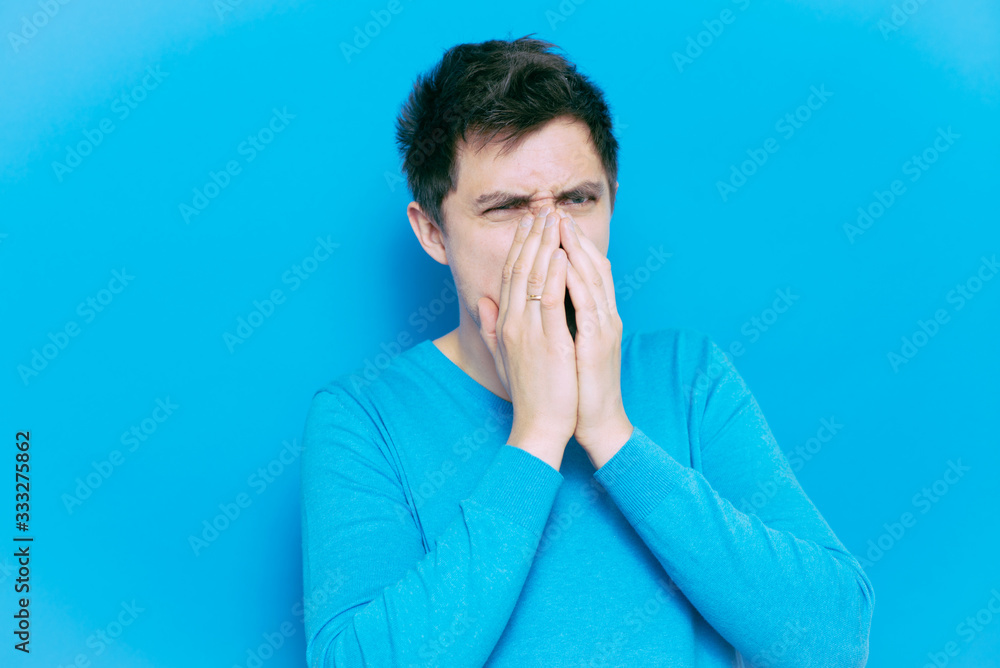 man laughs and covers her mouth man laughs and covers her mouth
