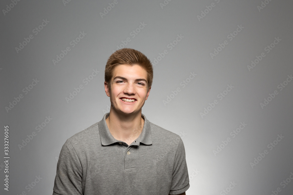 Fototapeta premium Studio portrait of an excited young man