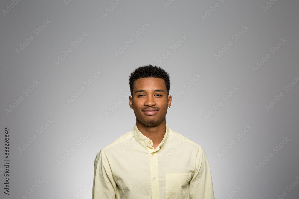Fototapeta premium Studio portrait of a thoughtful young man