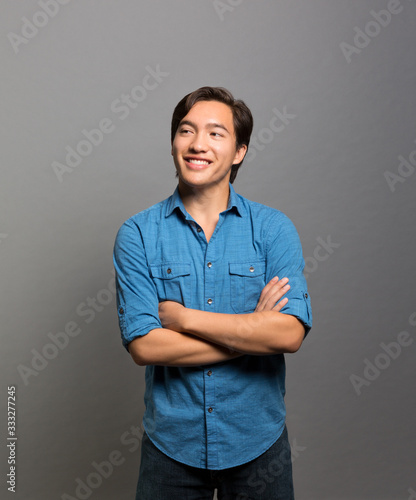 studio portrait of a happy young man 