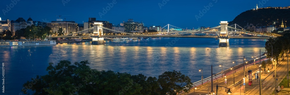 Budapest Chain Bridge at blue hour, long exposure, panoramic view. Hungary