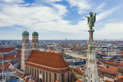 Muenchner Kindl and Frauenkirche in Munich photo