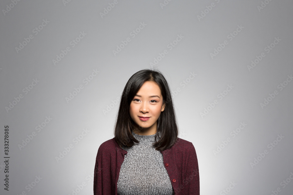 Fototapeta premium Studio portrait of a thoughtful young woman