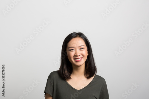 Studio portrait of an excited young woman 