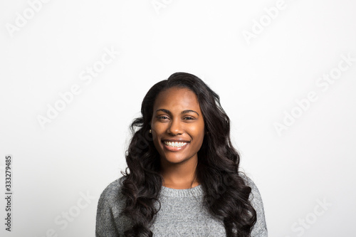 Studio portrait of a young woman smiling 
