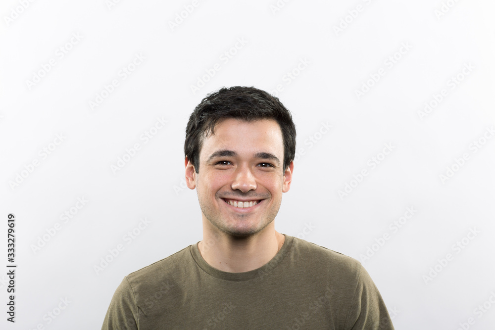 Fototapeta premium Studio portrait of a happy young man