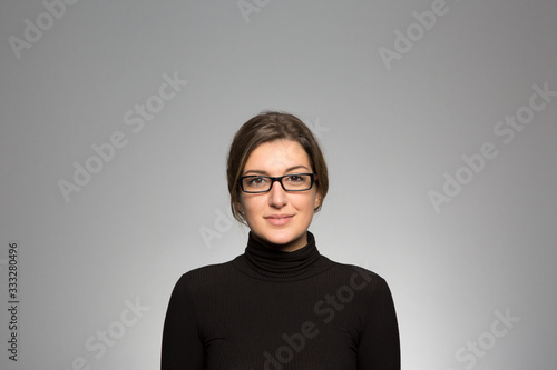 Studio portrait of a happy young woman
