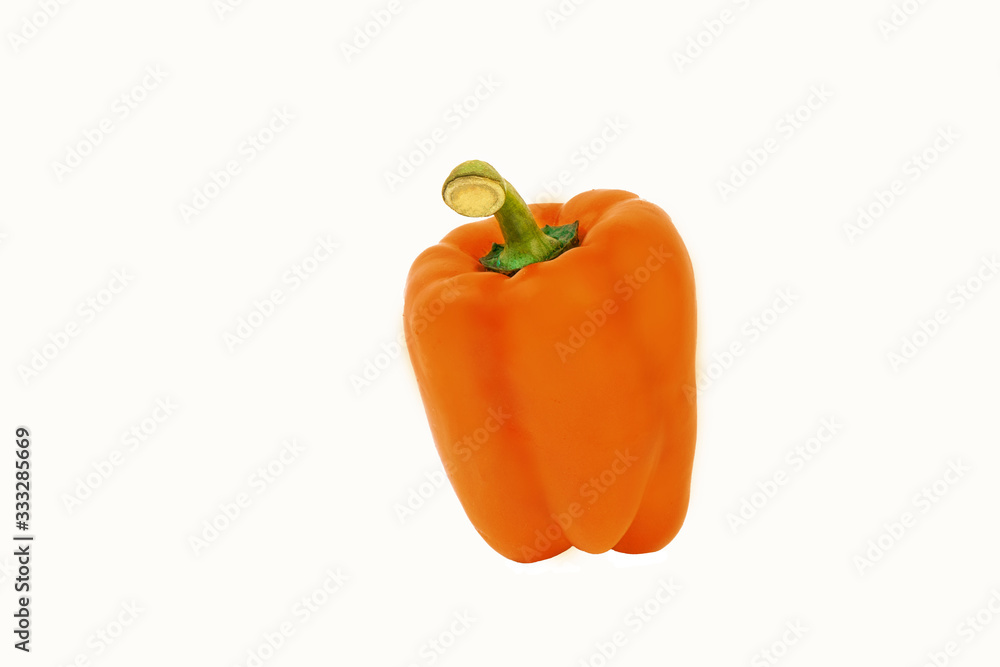 Orange sweet pepper on a white background Orange sweet pepper on a white background