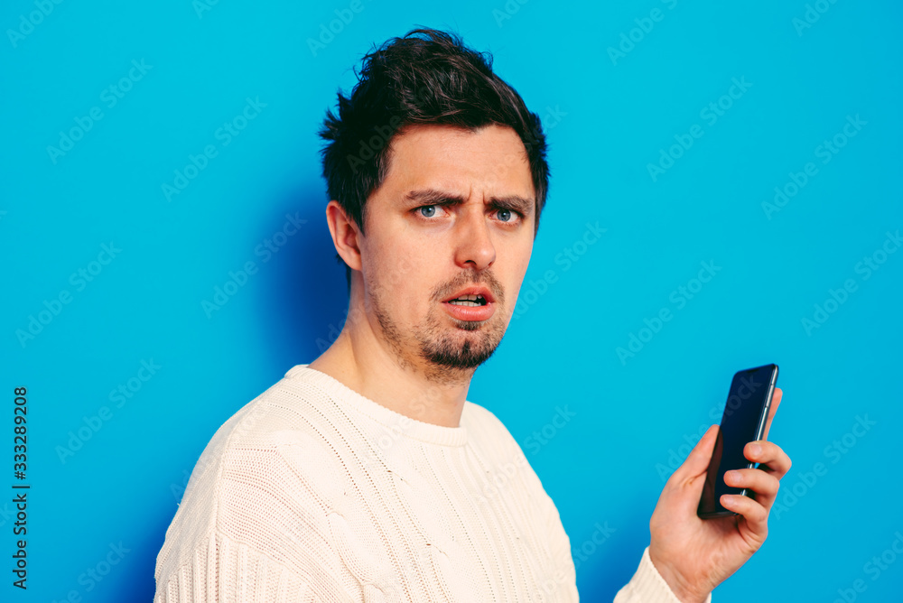 A man with a smartphone A man with a smartphone