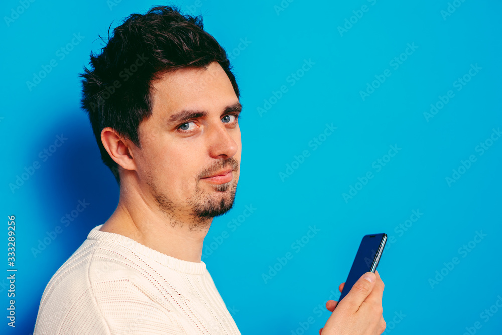 A man with a smartphone A man with a smartphone
