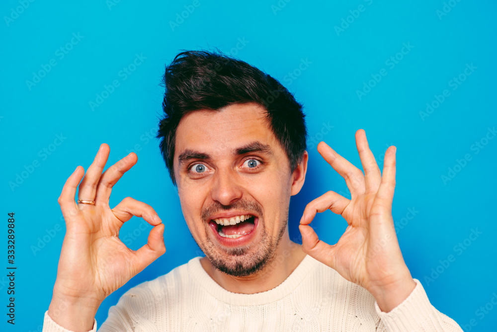 man shows that everything is fine, do not worry. all okay. Gesture. Close portrait. man shows that everything is fine, do not worry. all okay. Gesture. Close portrait.