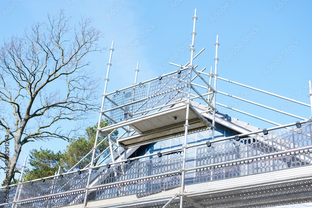Building affordable homes with scaffolding safety by local construction council to help government social housing problem and shortage England UK Building affordable homes with scaffolding safety by local construction council to help government social housing problem and shortage England UK