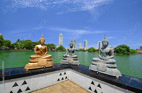 The Statues Of Gangarama Temple In Colombo, Sri Lanka. Gangarama Temple Is One Of The Beautiful Religious Structures In Colombo (With The Computer Color Effects) photo