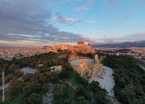 Aerial view of Acropolis of Athens, the Temple of Athena Nike, Parthenon, Hekatompedon Temple, Sanctuary of Zeus Polieus, Odeon of Herodes Atticus, Erechtheion at sunset