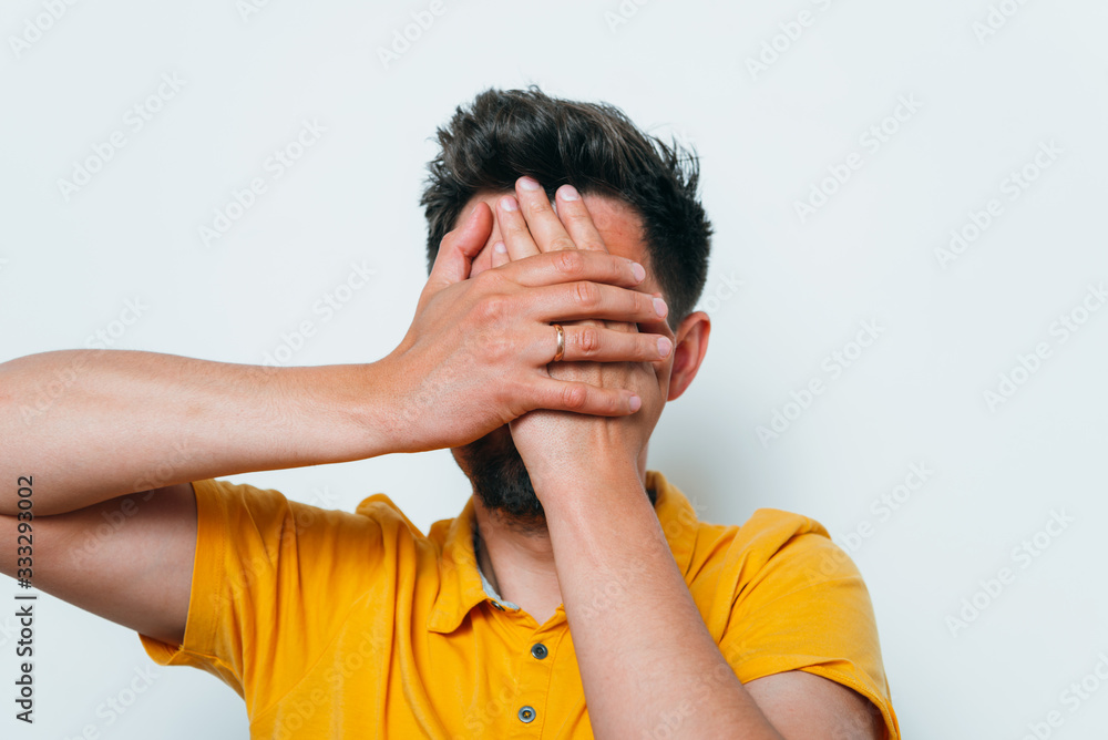 man covered his face with his hands man covered his face with his hands