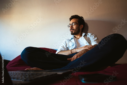 businessman man sitting working from home on a computer