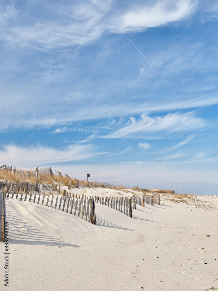 New Jersey Island Beach state park attempts to protect the massive and endangered sand dunes from wind and wave erosion, as well as human foot traffic with these wooden slat storm fencing New Jersey Island Beach state park attempts to protect the massive and endangered sand dunes from wind and wave erosion, as well as human foot traffic with these wooden slat storm fencing