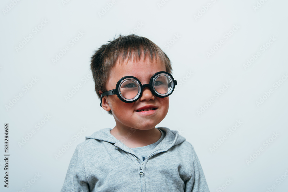 Little boy in funny glasses