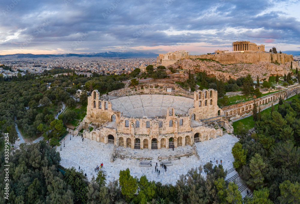 Aerial view of Acropolis of Athens, the Temple of Athena Nike, Parthenon, Hekatompedon Temple, Sanctuary of Zeus Polieus, Odeon of Herodes Atticus, Erechtheion at sunset