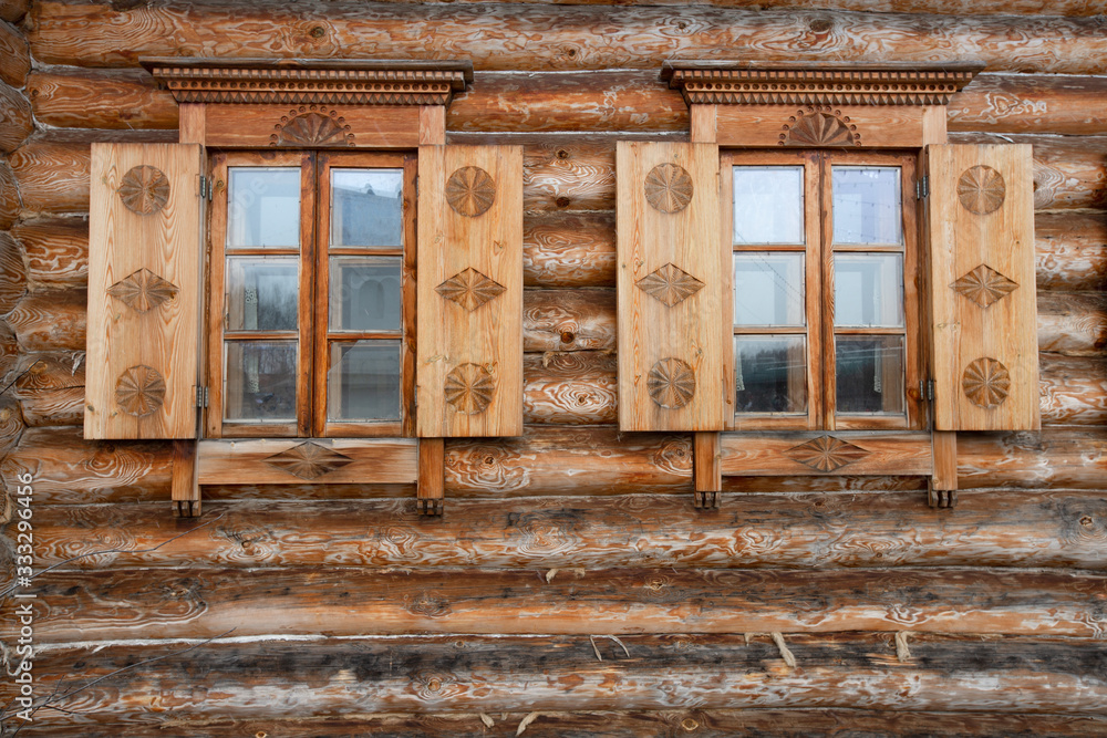 Log cabin with opened fences of window Log cabin with opened fences of window