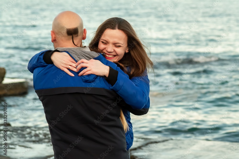 lovers' walk on the sea coast in spring lovers' walk on the sea coast in spring