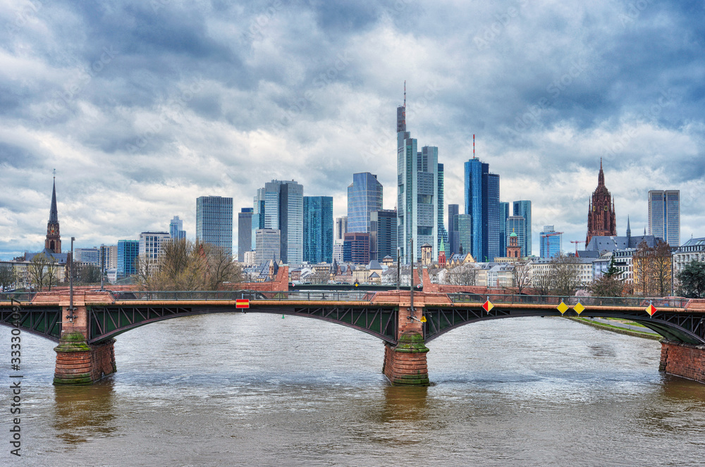 Naklejka premium Frankfurt Main, Germany, skyline with dramatic clouds over the skycrapers