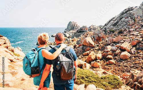 Couple at Capo Testa in Santa Teresa Gallura on Sardinia reflex