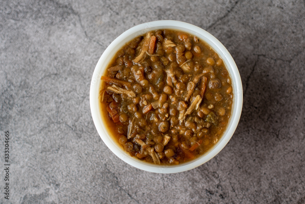 Lentil soup with chicken, Mediterranean soup with thick stew like broth. Lentil soup with chicken, Mediterranean soup with thick stew like broth.