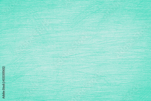 Pencil strokes on the paper, pencil drawing texture abstract background toned in trendy color 2020 year biscay green. photo