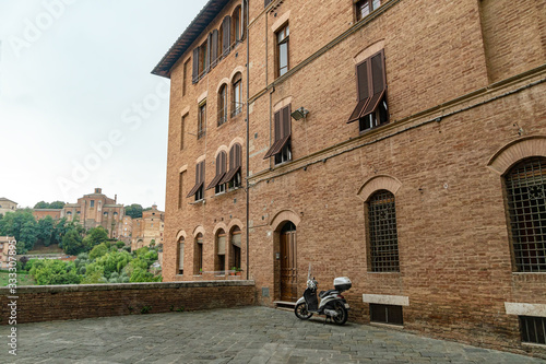 Old italian city, empty street of North Italy town at pandemic in Europe