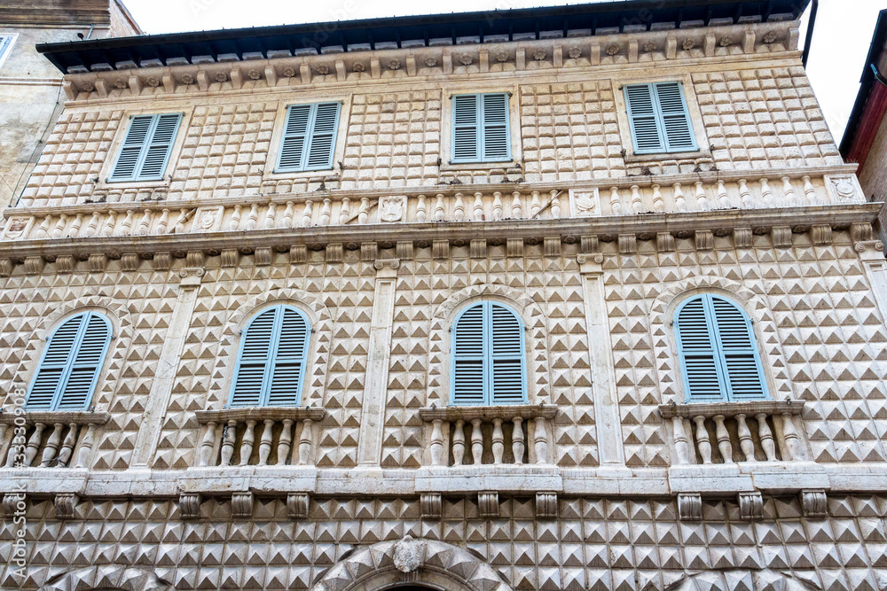 Palazzo dei Diamanti or Palace of Diamonds exterior low-angle street partial view in Macerata, Macerata Province, Marche Region, Italy