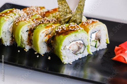 Sushi roll with eel and avo...