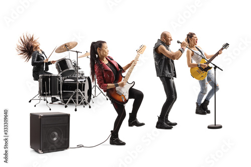 Rock music band with guitarists, drummer and a singer