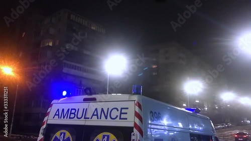 ambulance lights flicker at night