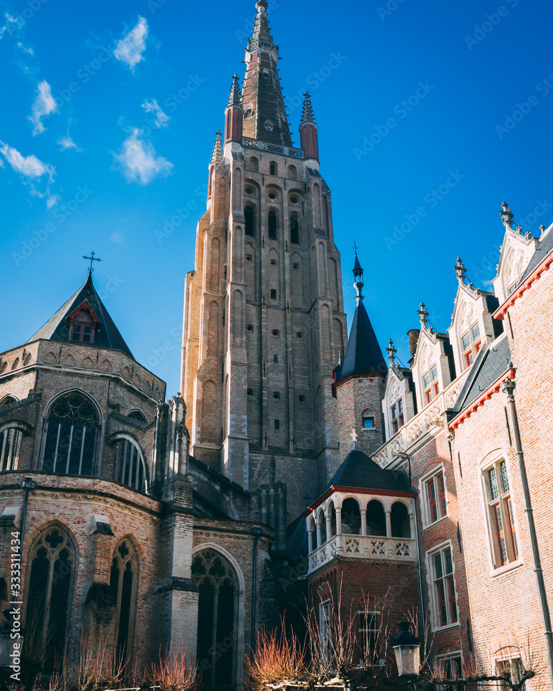 Church of Our Lady in Bruges, Belgium. Close view on gothic style.