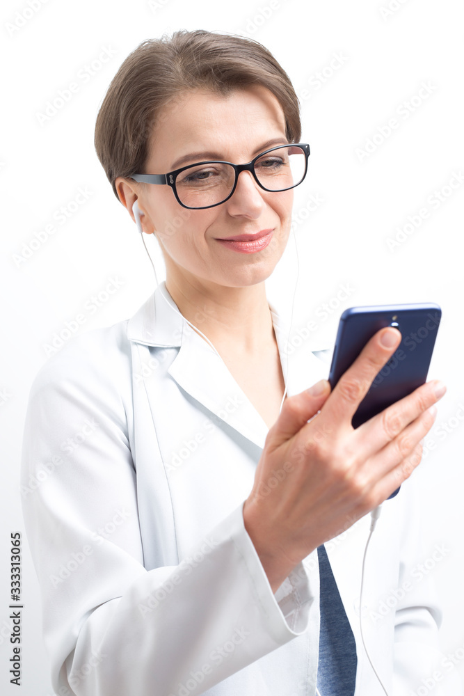 The doctor advises the patient online through a smartphone. Video conference of a doctor with a client via mobile phone.