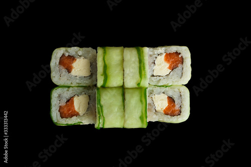 Japanese food: Set of salmon sushi and rolls with salmon and eel