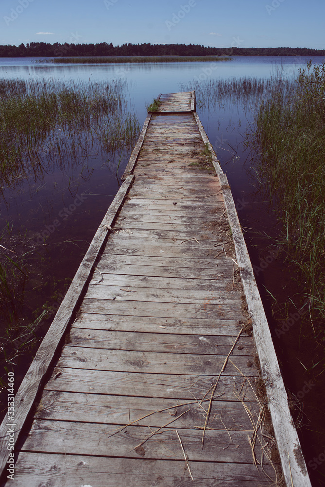 Fototapeta premium wooden bridge on the lake