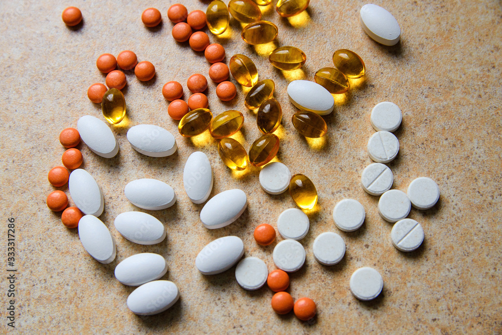 orange pills, vitamin D and fish oil capsules orange pills, vitamin D and fish oil capsules