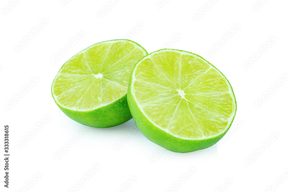 Lime with slices half isolated on white background. Green citrus fruit. with clipping path Lime with slices half isolated on white background. Green citrus fruit. with clipping path