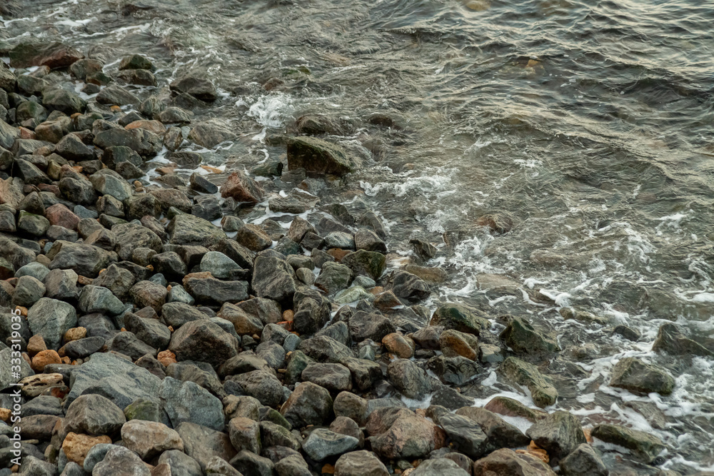 sea water with a wave tending to the shore sea water with a wave tending to the shore