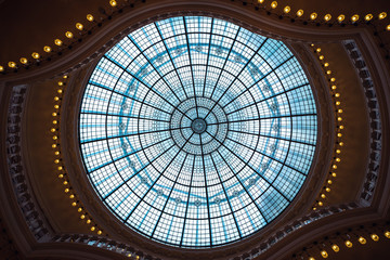 Ancient round window in roof in old Dutch building, beautiful geometry.