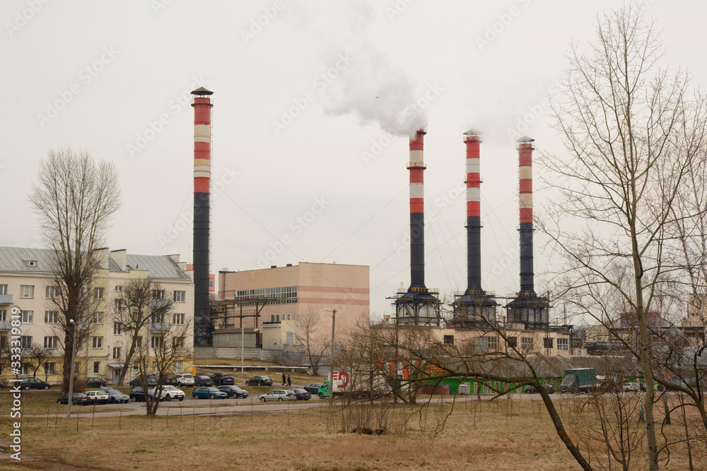 Environmental pollution. Smoke from the chimney of a power plant.