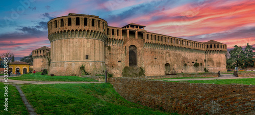 фотографія Imola castle in Central Italy with covered merlons  (the solid upright section o