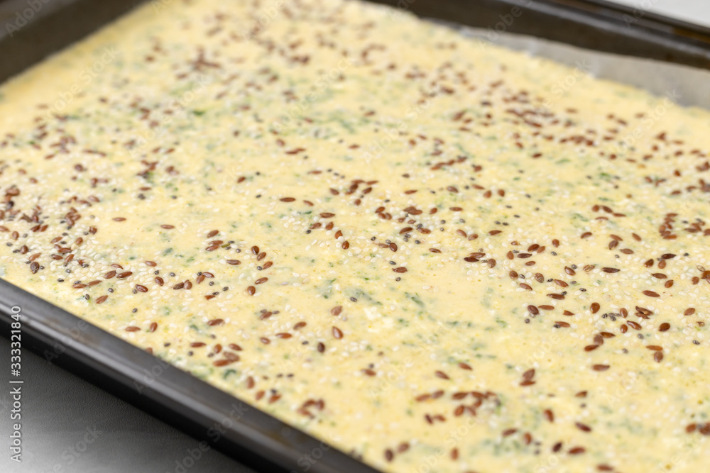 Raw Cornbread prepared for baking in baking tray Raw Cornbread prepared for baking in baking tray