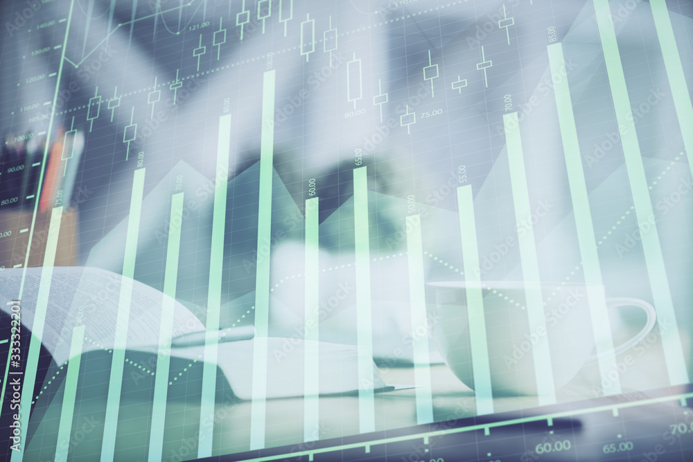 Multi exposure of forex graph drawing and desktop with coffee and items on table background. Concept of financial market trading Multi exposure of forex graph drawing and desktop with coffee and items on table background. Concept of financial market trading