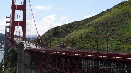 HD video zooming out from traffic on the Golden Gate Bridge, light traffic during the CoVID 19 pandemic home isolation city wide. 