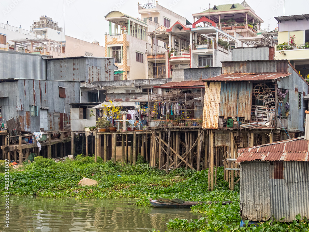 Houses along the Mekong River - Chau Doc Houses along the Mekong River - Chau Doc