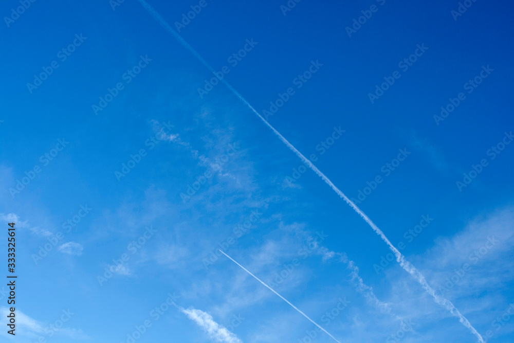 Vapor trails on the blue sky Vapor trails on the blue sky